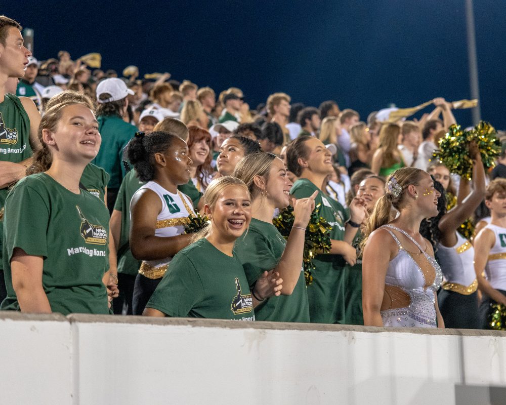 High school students at Charlotte football game
